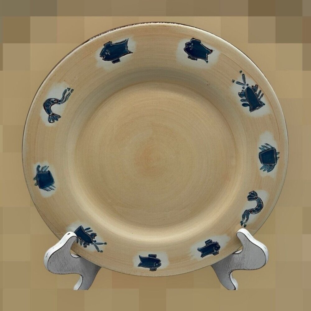 Pottery Barn Seafood Dinner Plate 12" Blue Seafood  Around With a Tan Background